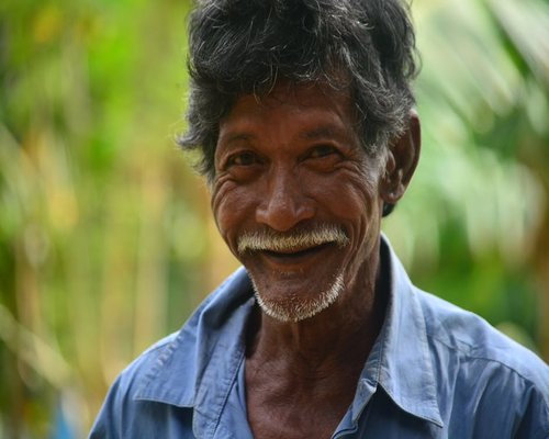 Middle-aged man looking healthy and confident outdoors