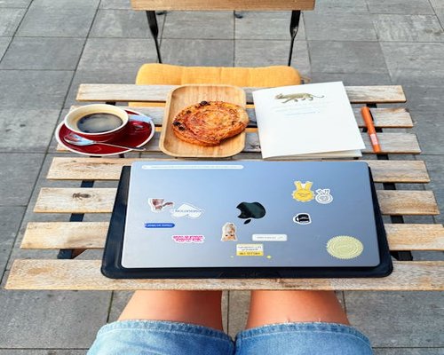 Laptop and coffee workspace